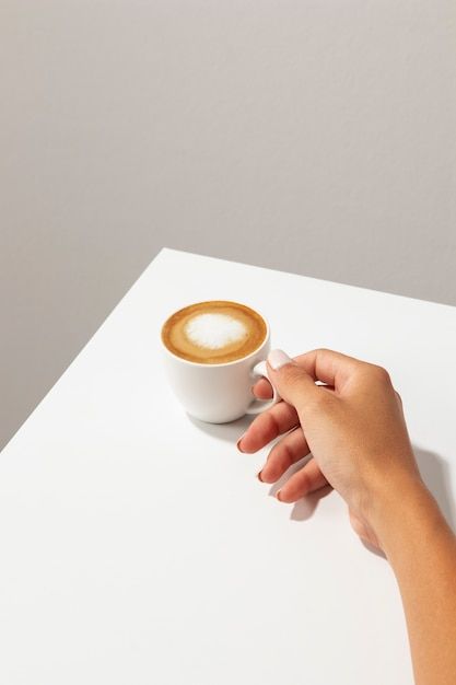 Free photo high angle hand holding coffe... | Free Photo #Freepik #freephoto #coffee-hand #coffee #caffeine #drink-coffee Coffee Hand Aesthetic, Hand Holding Coffee Cup, Hand Holding Cup, Coffee Reference, Holding Coffee Cup, Hand Modeling, Cup Aesthetic, Holding Coffee, Coffee Cup Photo