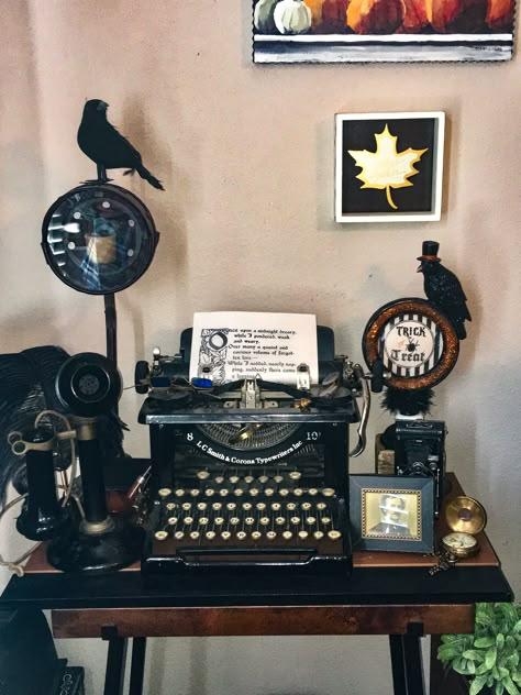 Vintage typewriter with Edgar Allen Poe The Raven poem in typewriter. Note the picture of Mr Poe on table. Edgar Allen Poe Inspired Bedroom, Edgar Allan Poe Halloween Decor, Edgar Allen Poe Party Decor, Edgar Allen Poe Decor Halloween Party, Edgar Allen Poe Decorations, Edgar Allen Poe Trunk Or Treat, Edgar Allen Poe Aesthetic Decor, Edgar Allen Poe Halloween Decor, Poe Halloween Decor