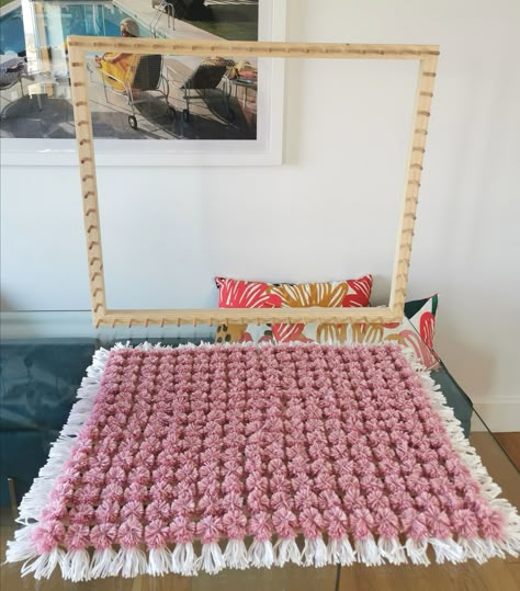 How to make a Pom Pom Blanket using a loom frame. Frame from Looming Mad Crafts on Etsy: www.etsy.com/uk/shop/LoomingMadCrafts #pompom #loom #pompomloom #pompomblanket #diyblanket #tutorial #crafts #diycrafts #easycrafts #beginnercrafts Pompom Blanket Loom, Pompom Rugs How To Make A, Loom Pom Pom Blanket, Pompom Blanket Frame, Pom Pom Loom Blanket, Pom Pom Blankets Tutorial, Homemade Loom How To Make, Loom Board Pom Pom Blanket, Pom Pom Baby Blanket Tutorial