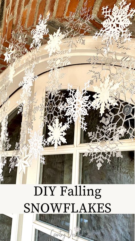 Dollar store snowflakes over door Snowflake Chandelier Diy, Easy Diy Snowflakes, Winter Ceiling Decorations Diy, Snowflake Installation, Christmas Diy Snowflakes, Decorate With Snowflakes, Snowflake Porch Decorations, Snowflake Hallway Decorations, Snowflake Hallway