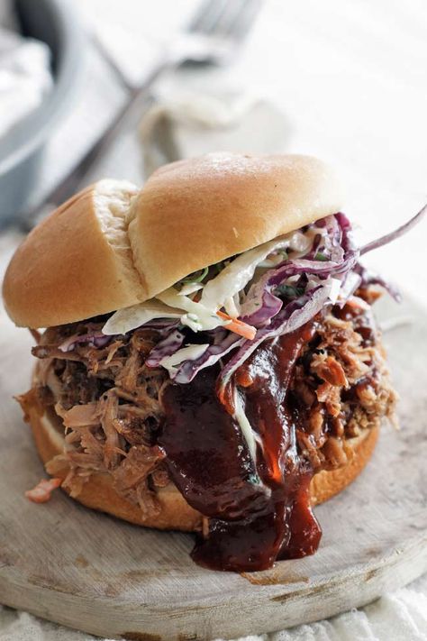 This slow cooker pulled pork is coated in a BBQ-style spice rub, seared, and braised slow in a crock pot for one juicy, tender pork shoulder. Bbq Pork Shoulder, Homestead Meals, Slow Cooker Pulled Pork Recipe, Slow Cooker Pork Shoulder, Pulled Pork Sauce, Bbq Pulled Pork Slow Cooker, Bbq Rub Recipe, Pork Slow Cooker, Pulled Pork Recipe Slow Cooker