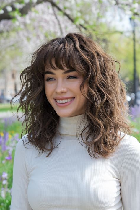 Embrace the charm of curly hairstyles paired with stylish curtain bangs! This look is perfect for medium to long hair, framing your face beautifully while enhancing your natural curls. Whether you wear it down in loose waves or half up for a playful vibe, this hairstyle is a summer favorite that’s easy to achieve. Perfect for any occasion, you'll definitely turn heads! #curlyhairstyles Loose Waves With Bangs, Curly Hairstyles With Curtain Bangs, Hair Framing, Hairstyles With Curtain Bangs, Medium Curly Haircuts, Medium To Long Hair, Medium Curly, Cute Curly Hairstyles, Stylish Curtains