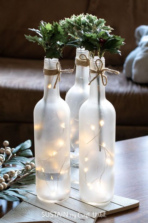 Wine Bottle Table Decorations, How To Frost Wine Bottles, Wine Bottle Centerpieces For Wedding Diy, Wine Bottle Crafts Wedding, Empty Wine Bottle Ideas Decor, Light Decorations For Party, Empty Wine Bottle Ideas, Wine Bottle Centerpieces For Wedding, Upcycle Wine Bottles