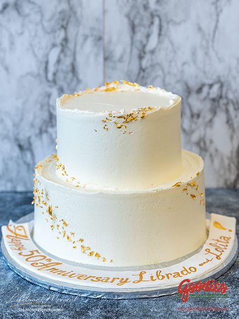 Gold Flakes On Cake, Gold Luster Dust Cake, Gold Flakes Cake, White And Gold Cake Simple, Simple Two Tier Cake, Gold Flake Cake, White And Golden Cake, Cake With Gold Flakes, Gold Foil Wedding Cake