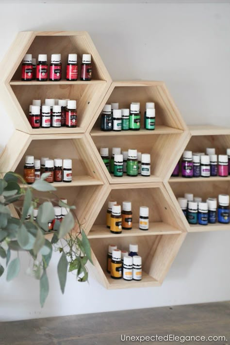 This is a pretty storage solution for housing all your essential oils!! Wall Storage Ideas, Essential Oil Rack, Essential Oils Organization, Oil Rack, Oil Shelf, Essential Oil Shelf, Diy Storage Shelves, Wall Storage Systems, Pretty Storage