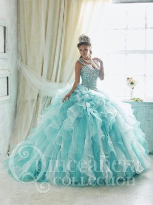 Pastel shades of blue remind us of the sea foam on the beach. A complementary color to this lovely sea foam blue is a blush pink, which make this color scheme perfect for an elegant Tiffany quinceanera themeor an under the sea theme. Under The Sea Quinceanera Theme, Quinceanera Collection, Quinceanera Dresses Blue, Blue Ball Gowns, Pretty Quinceanera Dresses, Quince Dress, Prom Ball Gown, Blue Dress Formal, Quinceanera Dress