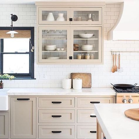 Happy Tuesday! At least it's not Monday anymore . . I am loving this kitchen by @prairie_home_styling ....the cabinet color is perfect with the black hardware and subway tile. I also love how the cabinets don't have backs to them simplistic drama! Photo: @ryangarvin . . What do you love in this kitchen?? . . . #interior4you #whiteinterior #hgtv #fixerupperstyle #fixerupper #homestyle #bhghome #pursuewhatislovely #theeverygirl #nothingisordinary #mydecorhaven #whitespaceswelove #mydecorvibe #desi Kitchen Gray, Kitchen Things, Casa Vintage, Classic Kitchen, Kitchen Farmhouse, Kitchen Cabinet Colors, Kitchen Redo, Range Hoods, Trendy Kitchen