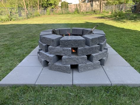 We were able to create a fire pit that allows a lot of air flow and doesn’t require any digging! It’s perfect for any rental properties that doesn’t allow digging!  Requirements:   16 - 15.6 in square stones 36 - 11.5 in x 4 in retaining wall block 0.5 cubic feet paver base And a way to make your yard level (we used a kobalt steel tamper)  We purchased all of this from Lowe’s for $150 (that’s including the tamper)  How to build:  1) level the ground you desire to place the fire pit 2) make a 4 x Retaining Wall Block Fire Pit, Cobblestone Fire Pit, Easy Diy Fire Pit Ideas Cheap, Homemade Fire Pits, Kitchen Backyard Ideas, Square Fire Pit Ideas, Block Fire Pit, Bbq Ideas Backyard, Paver Base