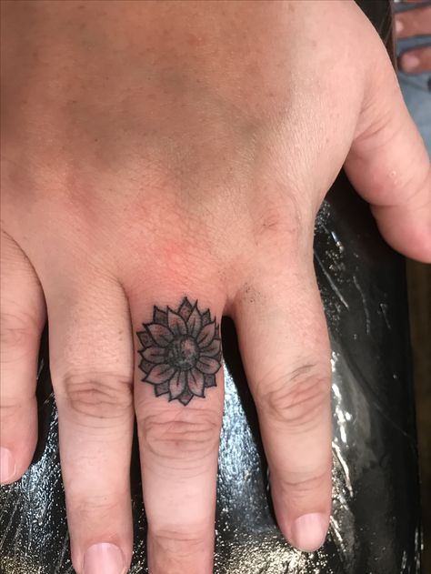 My new sunflower tattoo! #Fingertattoo #sunflower 🌻 Sunflower On Hand Tattoo, Sunflower Tattoo On Finger, Sunflower Ring Tattoo, Sunflower Tattoo Finger, Hand Sunflower Tattoo, Finger Cover Up Tattoo, Finger Tattoo Coverup, Sunflower Finger Tattoo, Sunflower Wedding Ring