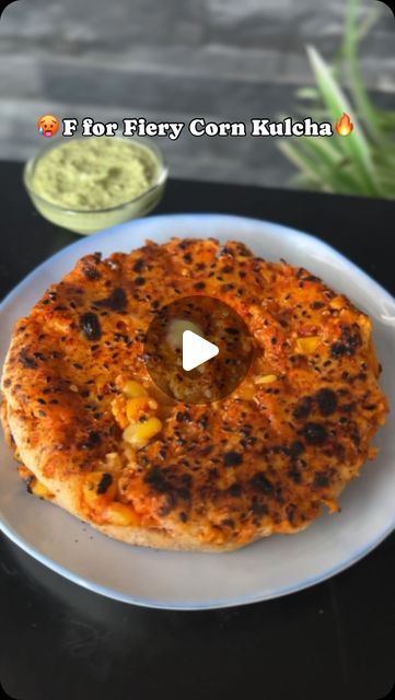 Diya Shah| Ahmedabad Food Blogger on Instagram: "F for Fiery Corn Kulchas🥵🔥😋🌽

Corn is in the season and I really love nimbu mirchi masala with it so let’s make Fiery Corn Kulchas from letter F for A to Z of Chaumasa food series.😋

How to?
✨ Mix together 1.5 cups wheat flour
1/2 tsp baking powder (optional)
Salt 
1 tbsp ghee
1/4 cup curd
✨ Add lukewarm water to knead a soft dough

🌽 For the filling:
✨ Pulse 1 cup boiled corn
Then add the following ingredients -
1/2 tbsp green chilli paste 
1 tbsp red chilli powder
Salt
Lemon juice 
1/2 cup mashed paneer/ boiled bananas

✨ Roll out the dough, add the stuffing, seal it completely, remove the excess dough, add sesame seeds and chilli powder on top, flatten out with your hands, apply water on its back and place on a hot tawa.
✨ Flip and Boiled Bananas, Street Food Indian, Recipes Corn, Banana Roll, Jain Recipes, Boiled Corn, Raw Banana, Red Chilli Powder, Paratha Recipes