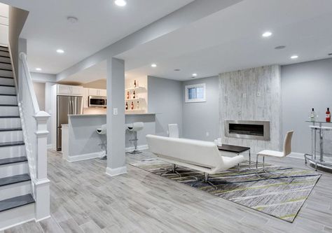 Modern basement living room with small kitchen porcelain tile floor and white furniture with fireplace Gray Basement, Basement Colors, Basement Paint Colors, Basement Painting, Basement Remodel Ideas, Basement Redo, Modern Basement, Bar In Casa, Home Basement