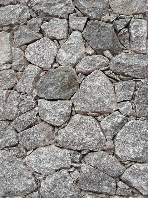 Closeup to a house rustic covering simulating a dry stone wall.  Related: Isolated Objects  Textures Stone Floor Texture, Stone Texture Wall, Stone Tile Texture, Road Texture, Stone Wall Texture, Stone Pavement, Stone Wall Design, Rock Textures, Floor Texture