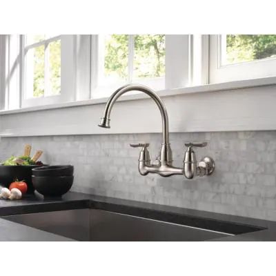 Corin 2-Handle Wall-Mount Kitchen Faucet in Stainless Kitchen Wall Faucet, Wall Mounted Kitchen Faucet, Wall Mount Kitchen Faucet, Hawthorne House, Kitchen Decor Styles, Black Kitchen Faucet, Amazing Kitchens, Wall Faucet, Basement Inspiration