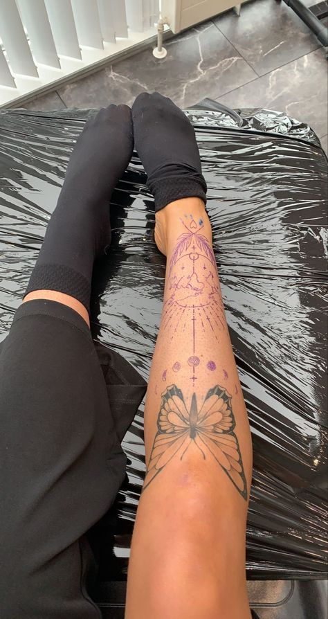 Shin Tattoos For Women Fine Line, Womens Around The Knee Tattoo, Butterfly Shin Tattoos For Women, Shin Tattoo Script, Unique Above The Knee Tattoo, Both Legs Tattoos For Women, Lower Knee Tattoos Women, Women’s Shin Tattoo Ideas, Surrounding Knee Tattoo