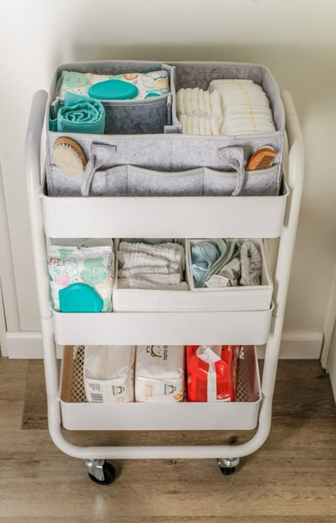 These nursery organization ideas for small spaces are amazing! Try these easy DIY storage hacks. You’ll be organizing your baby supplies like a pro. You have to see this three tier utility cart, it’s perfect for storing diapers, wipes, and all the baby essentials. #joyfullygrowingblog #organization #baby #nursery Uppfostra Barn, Perlengkapan Bayi Diy, Baby Nursery Diy, Baby Nursery Organization, Baby Room Organization, Baby Nursery Inspiration, Baby Storage, Baby Life Hacks, Diy Bebe