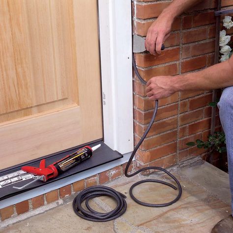 How to Replace an Exterior Door | The Family Handyman Diy Exterior Door, Replace Exterior Door, Cement Bricks, Exterior Door Frame, Exterior Door Trim, Installing Exterior Door, Prehung Exterior Door, Replacing Front Door, Metal Doors Exterior