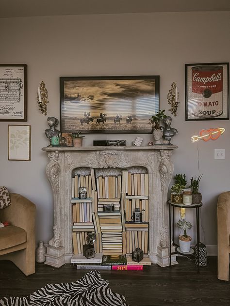 Fireplace Decor Aesthetic, Old Books In Fireplace, Faux Vintage Fireplace, Books Over Fireplace, Books In A Fireplace, Fireplace Book Storage, Mantle With Books, Fireplace Filled With Books, Fun Fireplace Ideas