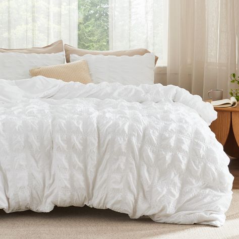 PRICES MAY VARY. Elegant Home Decor: This duvet cover set combines the exquisite seersucker craft with a checkered pattern, bringing a touch of sophisticated style to any sleeping space. Give the gift of elegant coziness to your loved ones, whether it’s for Mother’s Day, Valentine’s Day, Christmas, or just to show you care. Enhanced Sturdiness: This premium-quality and durable duvet cover set features neat stitching construction that ensures a stronger connection at the seams for enhanced sturdi White Bed Comforters Ideas, White Bed Sets, Textured Duvet Cover, Textured Duvet, Pillow Case Mattress, Boho Duvet Cover, Boho Duvet, Coastal Room, Bohemian Room