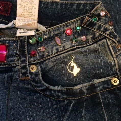 New With Tags. These Jeans Are One Of A Kind. The Rhinestones Are So Pretty. The Embroidery On The Back Pocket Is So Much Fun. The Style Is Boot Cut With Interesting Distressing On The Cuff. I Love The Weathered Or Distressing Appearance. The Fabric Content Is 96% Cotton And 4% Spandex. You Are Going To Feel So Glamorous In These Jeans. Thanks For Stopping By! #1522 Phat Pants, Baby Phat Jeans, Bedazzled Jeans, Mcbling Fashion, Embroidered Pocket, Baby Phat, How To Stretch Boots, Cute Jeans, Boot Cut Denim