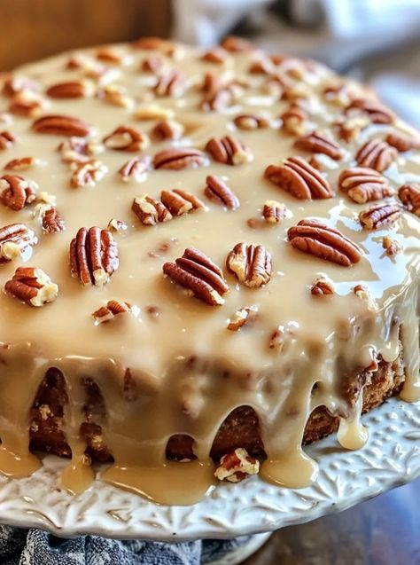 Butter Pecan Praline Poke Cake Recipe Pecan Praline Icing Recipe, Caramel Pecan Icing, Southern Praline Pecan Poke Cake, Southern Pecan Praline Sheet Cake, Yellow Poke Cake Recipes Condensed Milk, Pumpkin Praline Cake, Butter Pecan Praline Poke Cake Recipe, Pecan Cake Filling, Praline Bundt Cake Recipe