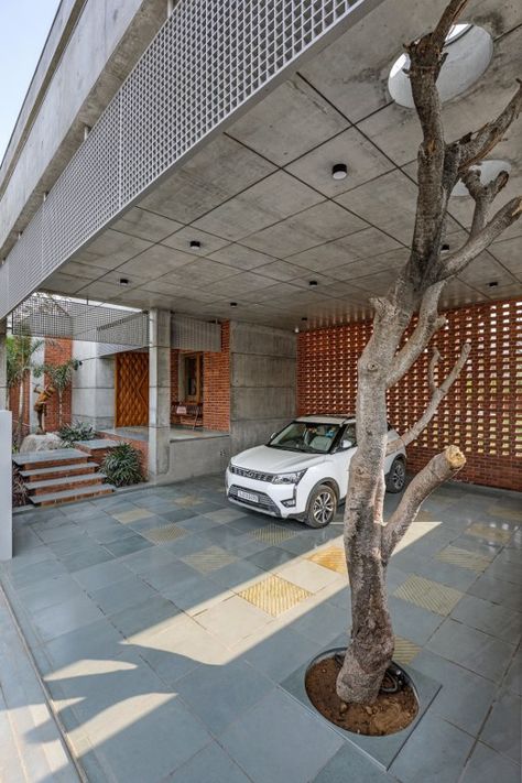 The Unconventional Finesse of Brick-and-Mortar In this Expansively Luxurious Residence | K.N.ASSOCIATES - The Architects Diary Kota Stone Flooring, Car Porch Design, Car Porch, Louis Sullivan, Wooden Columns, Form Follows Function, Brick Cladding, The Architects Diary, Concrete Facade