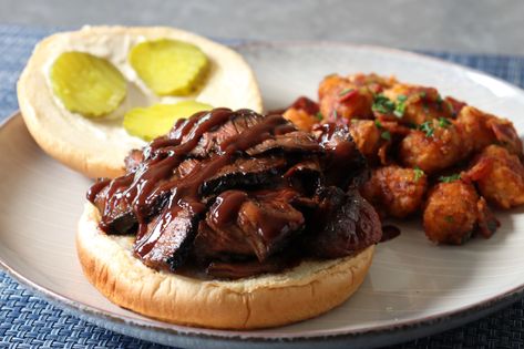 Cheap cuts of meat are transformed into tender barbecued roast beef by using Chef John's foolproof method. Beef On A Bun, Bbq Roast Beef, Build A Sandwich, Grilled London Broil, Chef John Recipes, Top Round Steak, Bbq Roast, Burgers And Hot Dogs, Meat Entrees