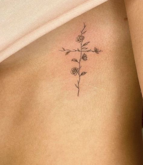 Simple Line Spine Tattoo, Dainty Women’s Tattoos, Dainty Religious Tattoos, Collar Bone And Shoulder Tattoo, Cross Tattoo Placement For Women, Rib Cross Tattoos For Women, Flower Cross Tattoos For Women, Cross On Ribs Tattoo, Women’s Cross Tattoo