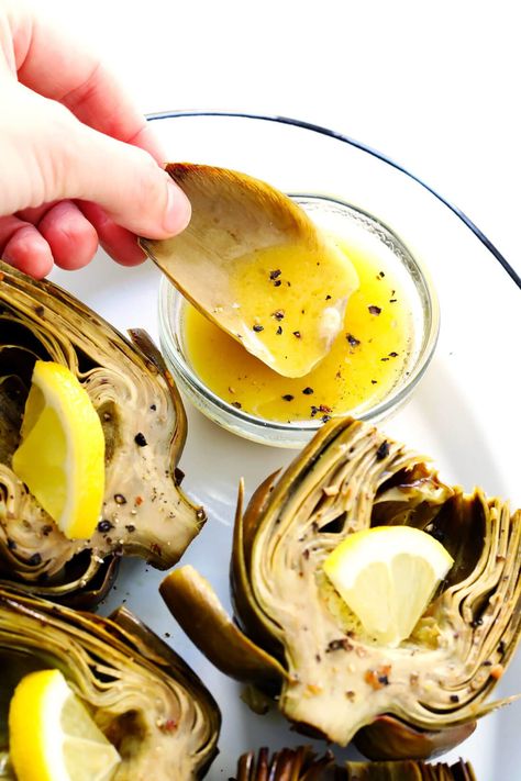 Seriously the most amazing roasted artichokes recipe! They're stuffed with lots of garlic and herbs, seasoned with lots of lemon and black pepper, and roasted to crispy, tender perfection. The perfect vegetable side dish! | Gimme Some Oven #artichokes #roasted #sidedish #vegetable #glutenfree #vegan Roasted Artichokes, Roasted Artichoke, Gimme Some Oven, Good Roasts, Artichoke Recipes, Vegetable Side Dish, Makanan Diet, God Mat, Vegetable Side