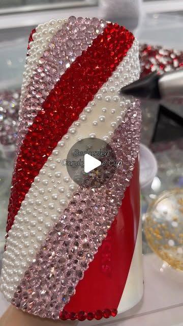 Bijou by Becca | Rhinestone & Crystal Artist on Instagram: "A little throwback to this bedazzled candy cane custom cup❤️
The pearls were the perfect addition instead of opal or white rhinestones ✨

#bedazzled #bling #diy #art #rhinestones #satisfying #crafts #candycane #holiday" Satisfying Crafts, Rhinestone Projects, Bling Crafts, Custom Cup, White Rhinestone, Artist On Instagram, Diy Art, Candy Cane, Crystal Rhinestone