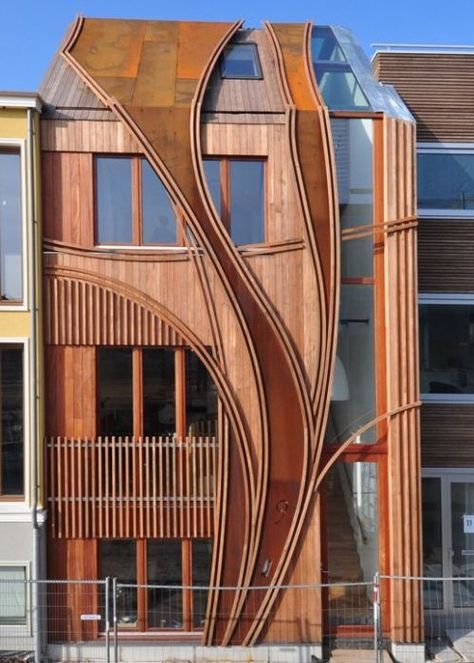 Leiden, South Holland, the agencyarchitecture Rotterdam 24H Architecture has created these two townhouses with stunning wood-clad facades, uniquely contemporary Art Nouveau style. The natural influence continues inside where organic and floral motifs adorn the walls and the stairwell. #architecture ☮k☮ Rotterdam Architecture, Texture Architecture, Wood Facade, Wooden Facade, Plans Architecture, Awesome Architecture, Nouveau Architecture, Art Nouveau Architecture, Abstract Art Paintings