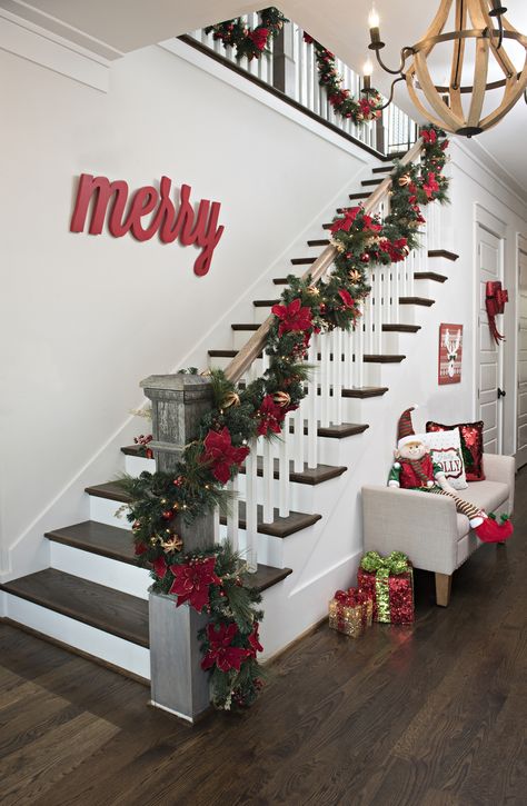 Check out our Merry and Bright Christmas decor for bright shades that will make your home feel like Santa's workshop! Try our Red Diamond Tinsel Garland around your tree or chairs for a unique and festive look. Stairs For Christmas, Decorating With Red, Christmas Stairs Decorations, Fireplace Walls, Christmas Staircase Decor, Christmas Stairs, Christmas Staircase, Christmas Entryway, Tv Walls