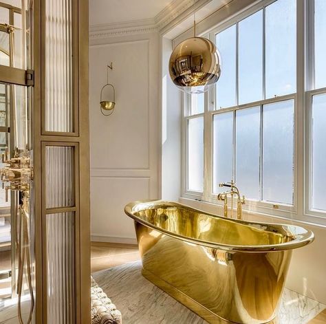 The gleaming vibrant tones of a pure brass bath create sunshiny warmth in interior design. #bathroomdesign #luxurybath #bathtub #bath #brassbath #copperbath Photo shared by Rhona Wilson-Owens on October 19, 2021 tagging @williamholland_ltd. #Regram via @CObL3amhXsK Maxamilist Interior, Golden Bathtub, Penthouse Bathroom, Parisian Bathroom, Colourful Bathroom, Disco Mirror, Luxurious Bathtubs, Belgravia London, Vintage Bathtub