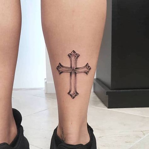 silhouette of a cross tattooed on the back of the leg of woman wearing black sneakers tattoos that mean strength Cross On Leg Tattoo, Cross Leg Tattoo, Cool Cross Tattoos, Unique Cross Tattoos, Cross Tattoo Ideas, Small Cross Tattoos, Tattoos Cross, Tattoo Son, Tattoo Sites