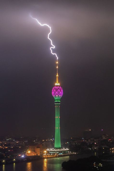 Lotus Tower is a 350 m (1,150 ft) tall tower, located in Colombo, Sri Lanka. It has been called a symbolic landmark of Sri Lanka. As of 2019, the tower is the tallest self-supported structure in South Asia the 11th tallest tower in Asia, and the 19th tallest tower in the world. The lotus-shaped tower is used for communication, observation, and other leisure facilities. #Ecofriendlytourist #travelaesthetic #beautifuldestinations #Dreamplace People On Vacation, Lotus Tower, Mushroom Land, Travel Sri Lanka, Colombo Sri Lanka, Sri Lanka Travel, 2024 Year, Simple House Plans, Luxury Accommodation