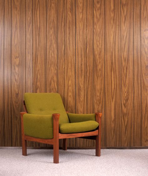 Why You Should Reconsider Wood Paneling Mid Century Wood Paneling, Wood Paneling Living Room, Wood Panneling, Mad Cap, Poltrona Design, Beadboard Wainscoting, Panel Walls, Wooden Panelling, Wood Panelling