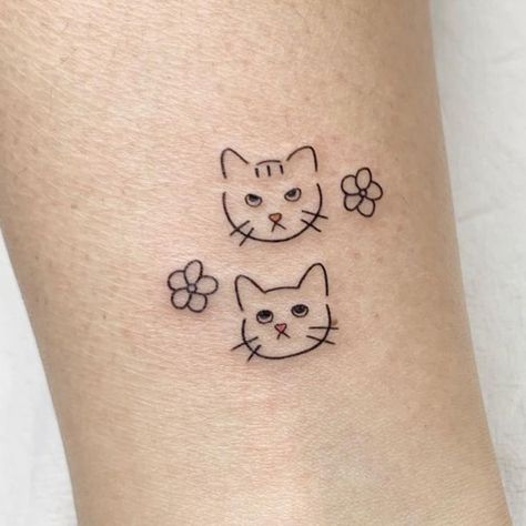 Top Minimal And Small Cat Tattoos You'll Want To See | Inku Paw Mean Cat Tattoo, Minimalist Two Cat Tattoo Designs, Tattoo Cat Outline, Kitten Paws Tattoo, Minimalist Kitten Tattoo, Tiny Matching Cat Tattoos, Three Cats Tattoo Simple, 2 Cats Together Tattoo, Small Two Cat Tattoo