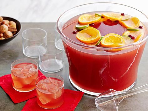 Cosmopolitan Fizz-Punch Recipe | Food Network Kitchen | Food Network Xmas Punch, Ginger Ale Punch, Vodka Cranberry, Cocktail Fruit, Ice Ring, Batch Cocktails, Punch Recipe, Punch Bowls, Fresh Cranberries