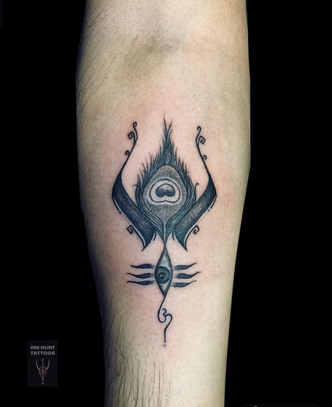 Trishul signifying as lord shiva and peacocks feather as lord Krishna Krishna And Shiva Together Tattoo, Shiv And Krishna Together Tattoo, Krishna Shiva Tattoo, Shiv Krishna Tattoo, Shiva And Krishna Tattoo, Shiva And Krishna Together, Krishna Tattoo Design For Men, Lord Krishna Tattoo Design, Radha Krishna Tattoo Design