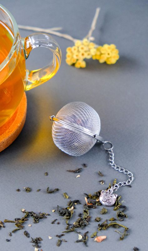 These tea ball Infuser are a great way to enjoy whole leaf tea and makes a cute gift for any tea drinker tea teatime teaballInfuser TeaStrainer TeaInfuser Brighton Townhouse, Tea Balls, Table Wear, Ball Aesthetic, Girls Stuff, Afternoon Tea Parties, Iphone Watch, Herbal Infusion, Bookish Things