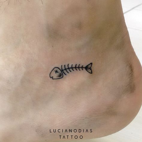 Mini fishbone tattoo made by me at the Black Box Studio. Tiny Bone Tattoo, Fish Stick And Poke Tattoo, Small Bone Tattoo, Fish Bone Tattoo Simple, Fish Skeleton Tattoo Simple, Simple Shin Tattoo, Bonefish Tattoo, Bone Fish Tattoo, Fish Finger Tattoo