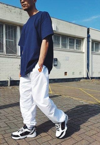 NEW FMC BAGGY TRACKIES WHITE [TRACKSUIT-TRACKIE-BOTTOMS] White Joggers Outfit Men, Baggy Tracksuit Outfit, White Tracksuit Outfit, Baggy Clothes Outfit Men, White Joggers Outfit, Black Sweats Outfit, Groovy Fits, Sweatpants Aesthetic, Athleisure Streetwear