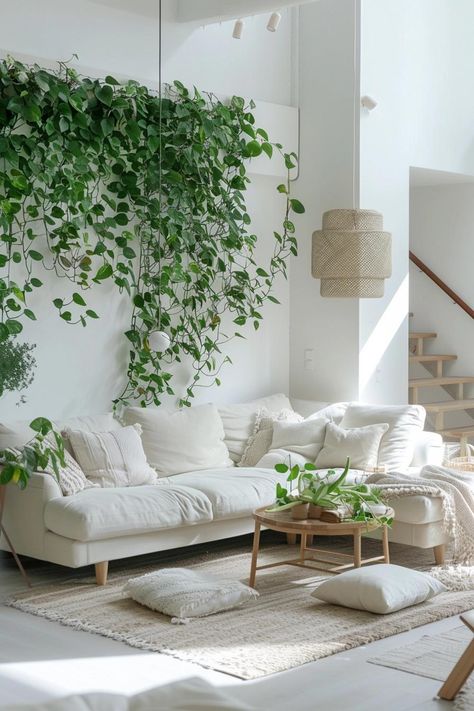 How to Create a Living Plant Wall Inside Your Home Wall Plants Living Room, Home Office Plant Wall, Plant Ledge Decorating Vaulted Ceilings, Hanging Plant Living Room, Indoor Greenery Wall, Wall With Plants Indoor, Plant Wall Dining Room, Wall Plants Indoor Living Rooms, White Living Room With Plants