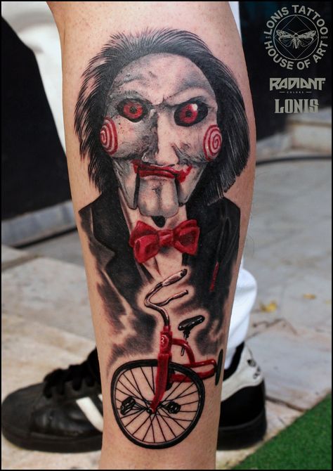 Billy the puppet-Saw,Jigsaw tattoo by Lonis Saw Doll On Tricycle #lonistattoo Athens,Greece www.lonistattoo.com Billy Saw Tattoo, Saw Tattoo, Horror Leg Sleeve, Jigsaw Tattoo, Billy The Puppet, Dna Tattoo, Horror Movie Tattoos, Castle Tattoo, Horror Tattoos