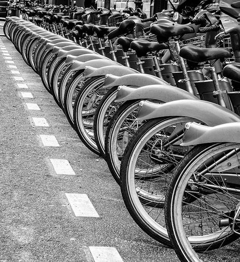 This is an example of maximum depth of field. The image was taken low enough to obtain all the bicycles as well as making sure they are all in focus, creating as if the bicycles never end. Field Of Depth Photography, Large Aperture Photography, Deep Focus Photography, Repetition In Photography, Extended Depth Of Field Photography, Patterns And Repetition Photography, High Depth Of Field Photography, Repetition Photography Ideas, Depth Of Field Photography Ideas At Home