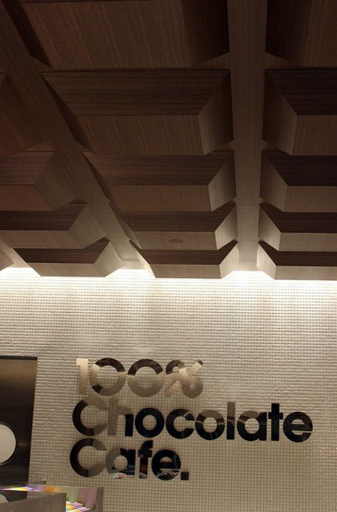 100% chocolate cafe is run by old Japanese chocolate brand, Meiji. The environment was designed by Masamichi Katayama of Wonderwall, while all the graphics were by Groovisions. Chocolate Pelo, Chocolate Store Design, Meiji Chocolate, Chocolate Museum, Chocolate Boutique, Chocolate Store, Japanese Chocolate, Chocolate Shops, Chocolate Stores