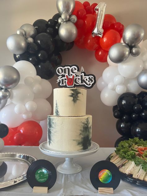 Rock And Roll Party Balloon Arch, Rock N Roll Cake Ideas, Rock N Roll First Birthday Cake, One Rocks First Birthday Photoshoot, Rocker 1st Birthday, Rocked My First Year Birthday, Rock And Roll Dessert Table, One Rocks First Birthday Smash Cake, Metallica One Birthday