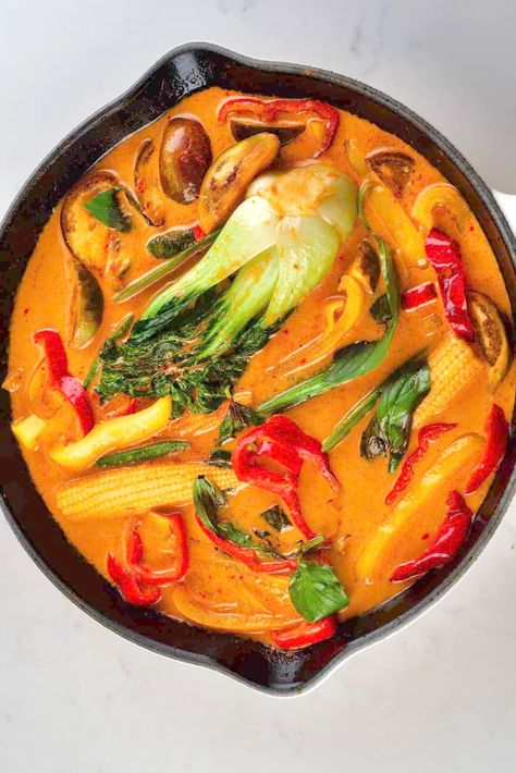 Make this Thai red curry from scratch at home for a simple and delicious mid-week meal ready in just 25 minutes! Packed with flavor and yet super customizable - this version is a nutrient-dense Thai vegetable curry. Plus, with a red curry paste made from scratch, you'll never want to buy pre-made sauce again! Vegetable Red Thai Curry, Easy Red Curry Recipe, Red Thai Curry Recipes, Red Thai Curry Vegetarian, Thai Red Curry Vegetarian, Vegetarian Red Curry, Thai Cooking Recipes, Easy Thai Red Curry, Thai Vegetable Curry