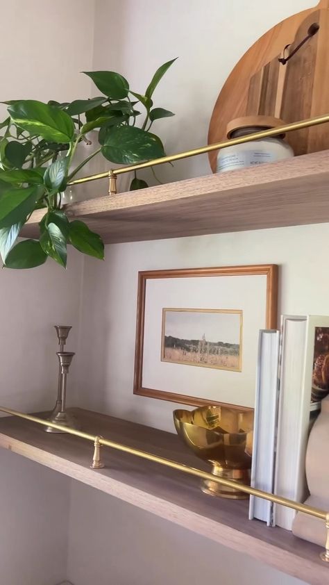 Floating Shelves With Gold Brackets, Floating Glass Display Shelves, Gold Shelf Brackets Kitchen, Shelves With Brackets Living Room, Vintage Brass Shelf Rail, Kitchen Ledge Shelf, Brass Railing Shelf, Floating Shelves With Gallery Rail, Open Shelves With Brass Rail