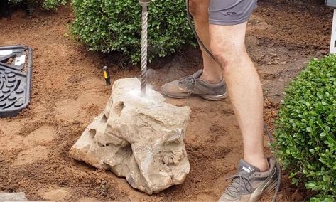 rock fountain drill the rock (1) River Rock Water Feature, Rock Bubbler Fountain, How To Drill Holes In Rocks, Rock Fountain Diy, Rock Fountains Outdoor, Bubbling Rock Fountain, Yard Waterfall, Backyard Waterfall Ideas, Boulder Fountain