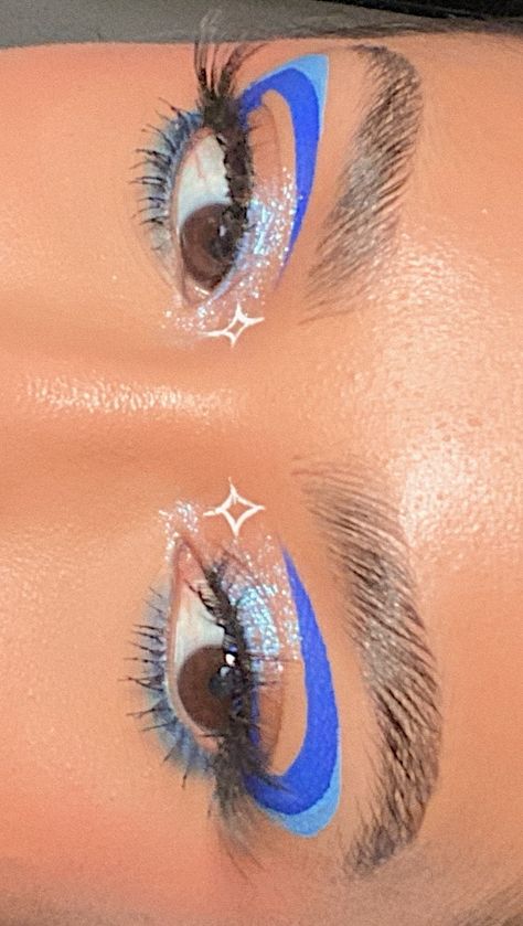 Space Eyeliner Looks, Blue Beetle Makeup, Blue And White Graphic Liner, Graphic Eyeliner Makeup Looks, Blue Liner Looks, Purple And Blue Eyeliner, Blue Graphic Eye Makeup, Light Blue Graphic Liner, 2 Color Eyeliner